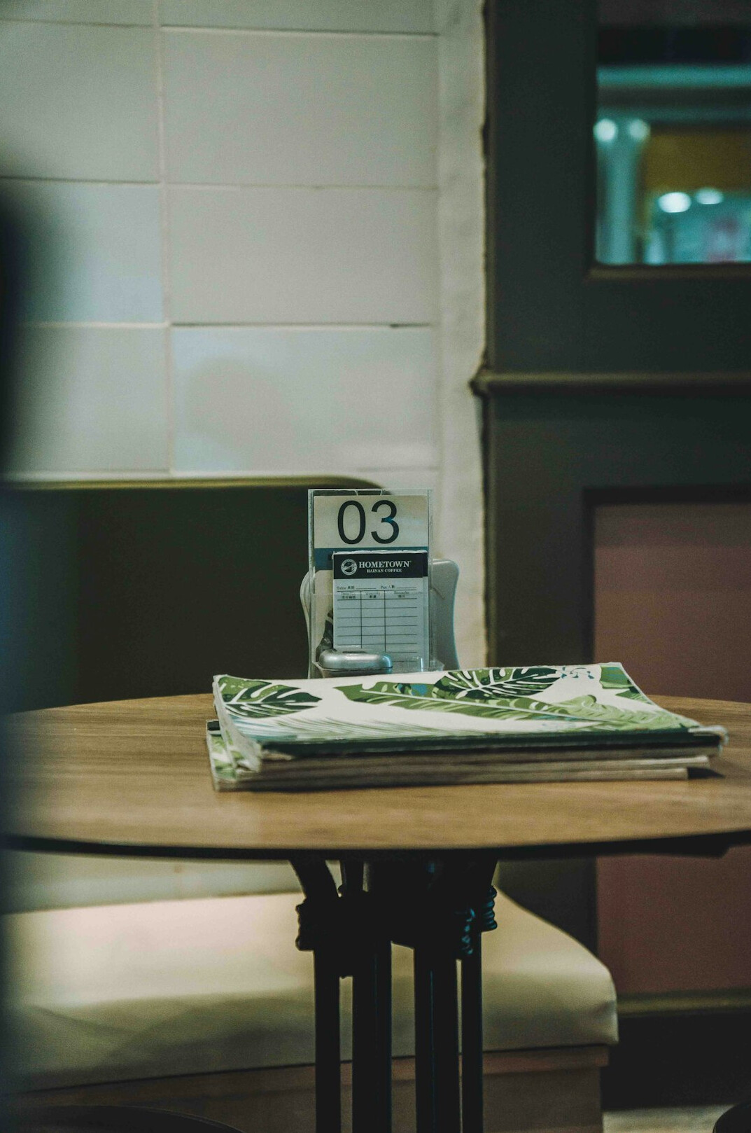 bench with newspaper and coffee cup